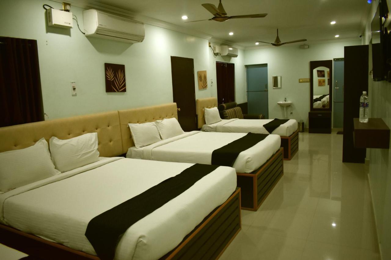 Hotel Apple Park Inn Tiruchirappalli Oda fotoğraf